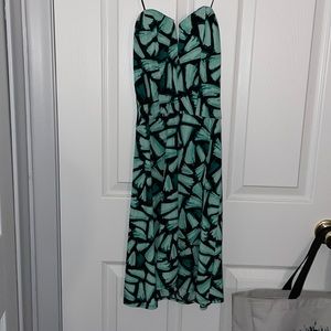Black and turquoise strapless dress. Size is an XS.